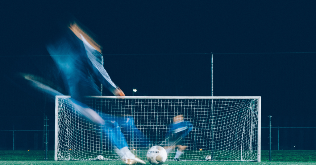 Image of a footballer taking a penalty kick